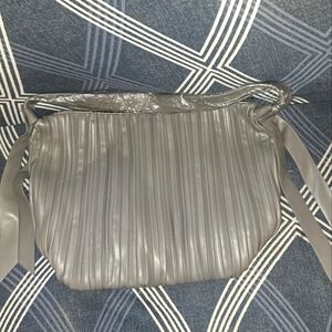 Gray puffy purse. New